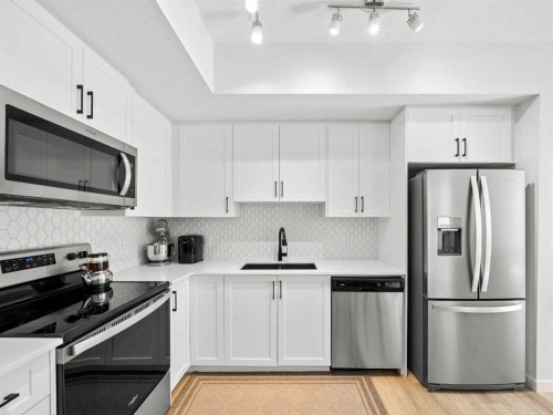 3111-3727 Sage Hill, Calgary, AB - Indoor Photo Showing Kitchen With Stainless Steel Kitchen With Upgraded Kitchen