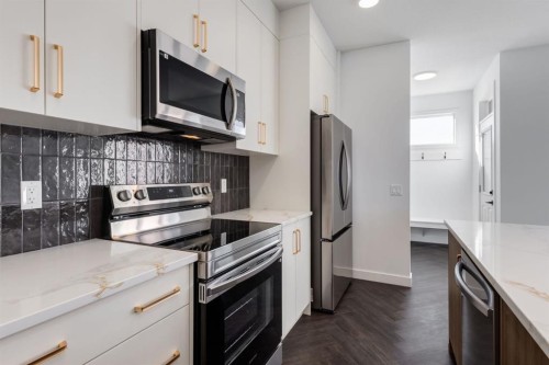 219 Sora Boulevard Se, Calgary, AB - Indoor Photo Showing Kitchen With Upgraded Kitchen