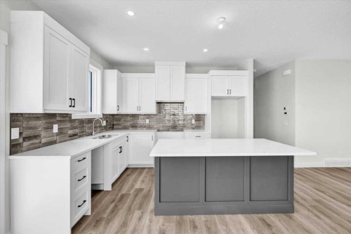 2016 30 Avenue, Nanton, AB - Indoor Photo Showing Kitchen With Upgraded Kitchen