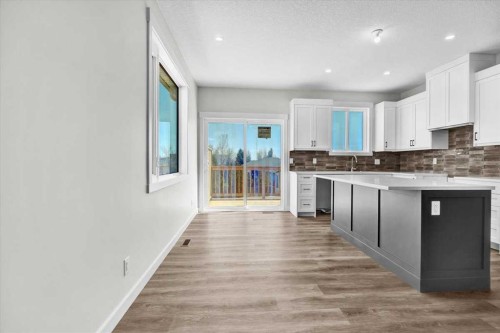 2016 30 Avenue, Nanton, AB - Indoor Photo Showing Kitchen
