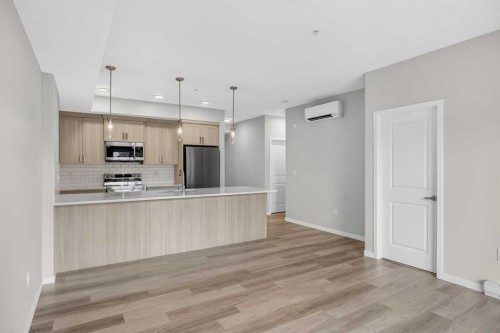 1206-33 Carringham Gate Nw, Calgary, AB - Indoor Photo Showing Kitchen With Upgraded Kitchen