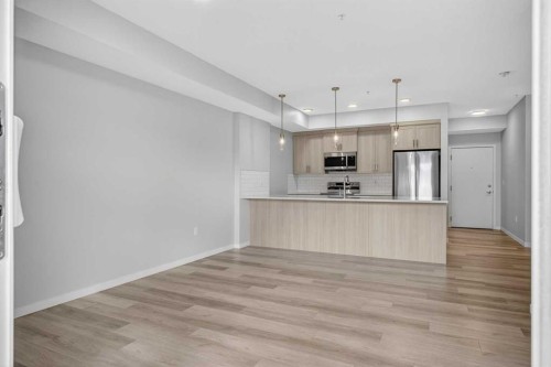 1206-33 Carringham Gate Nw, Calgary, AB - Indoor Photo Showing Kitchen