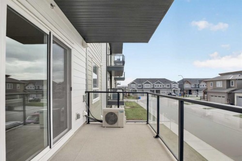 1206-33 Carringham Gate Nw, Calgary, AB - Outdoor With Balcony With Exterior