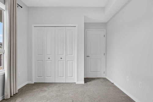 1206-33 Carringham Gate Nw, Calgary, AB - Indoor Photo Showing Other Room