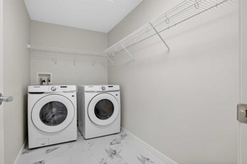 1206-33 Carringham Gate Nw, Calgary, AB - Indoor Photo Showing Laundry Room