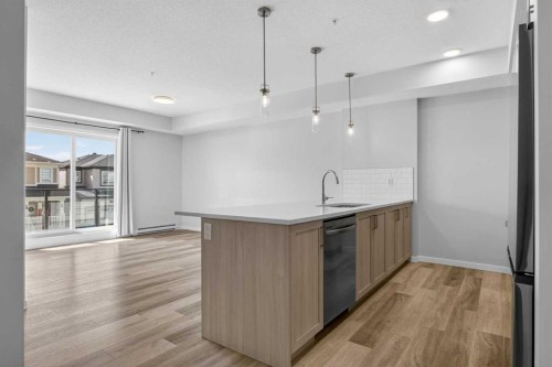 1206-33 Carringham Gate Nw, Calgary, AB - Indoor Photo Showing Kitchen