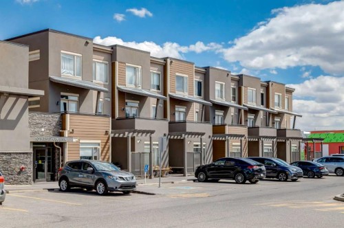207-10 Westpark Link, Calgary, AB - Outdoor With Balcony With Facade