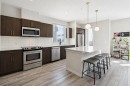 222-7 Westpark Common Sw, Calgary, AB  - Indoor Photo Showing Kitchen With Upgraded Kitchen 