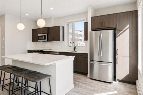 222-7 Westpark Common Sw, Calgary, AB - Indoor Photo Showing Kitchen With Upgraded Kitchen