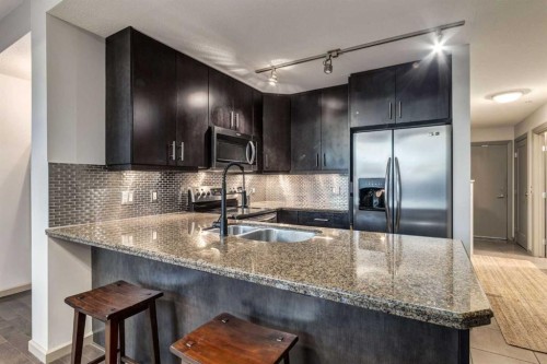 1901-210 15 Avenue Se, Calgary, AB - Indoor Photo Showing Kitchen With Stainless Steel Kitchen With Double Sink With Upgraded Kitchen