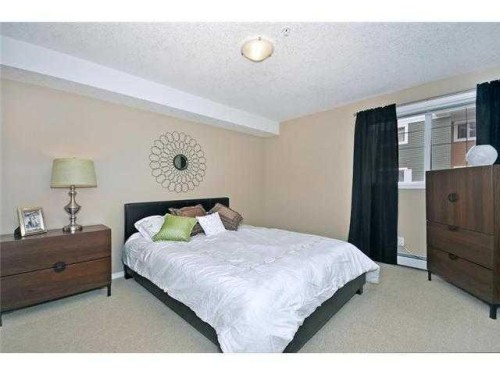 2310-10 Prestwick Bay Se, Calgary, AB - Indoor Photo Showing Bedroom