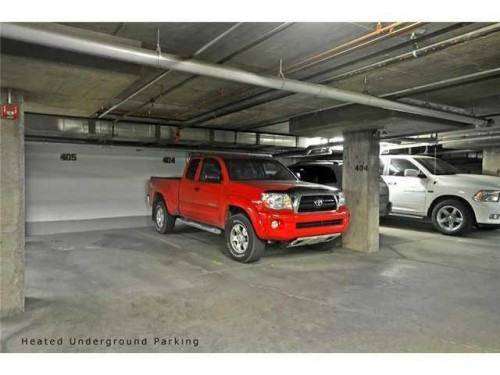 2310-10 Prestwick Bay Se, Calgary, AB - Indoor Photo Showing Garage