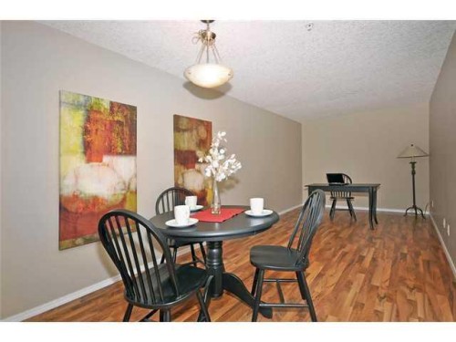 2310-10 Prestwick Bay Se, Calgary, AB - Indoor Photo Showing Dining Room