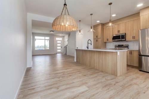 235 Sora Boulevard Se, Calgary, AB - Indoor Photo Showing Kitchen With Upgraded Kitchen