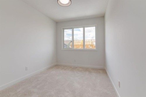 235 Sora Boulevard Se, Calgary, AB - Indoor Photo Showing Other Room
