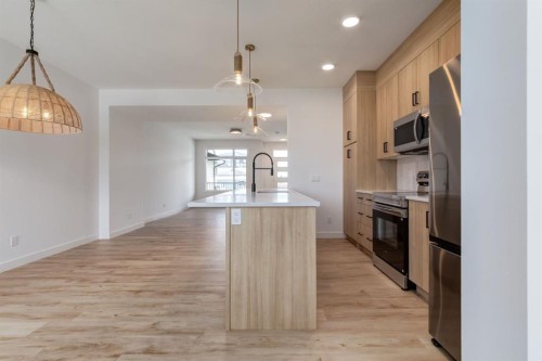 235 Sora Boulevard Se, Calgary, AB - Indoor Photo Showing Kitchen
