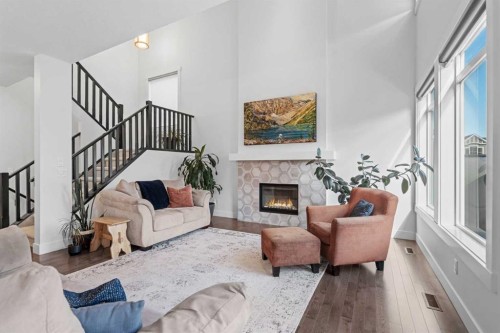 25 Westland Crescent Sw, Calgary, AB - Indoor Photo Showing Living Room With Fireplace