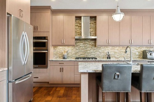 36 Ridge View Close, Cochrane, AB - Indoor Photo Showing Kitchen With Stainless Steel Kitchen With Upgraded Kitchen