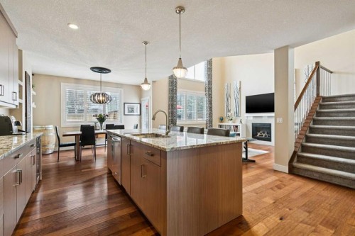 36 Ridge View Close, Cochrane, AB - Indoor Photo Showing Kitchen With Upgraded Kitchen