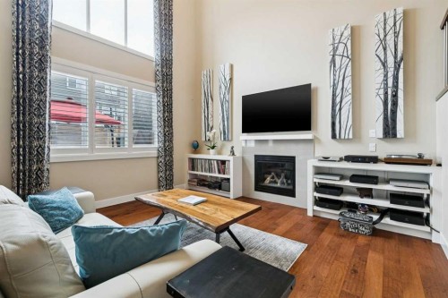 36 Ridge View Close, Cochrane, AB - Indoor Photo Showing Living Room With Fireplace