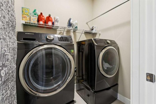 36 Ridge View Close, Cochrane, AB - Indoor Photo Showing Laundry Room