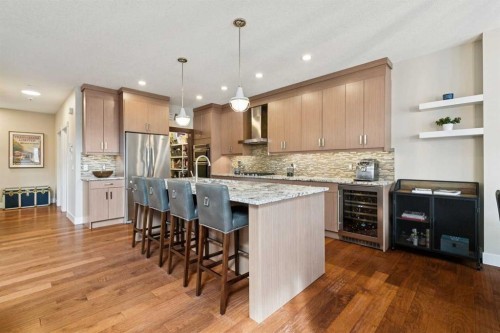 36 Ridge View Close, Cochrane, AB - Indoor Photo Showing Kitchen With Upgraded Kitchen