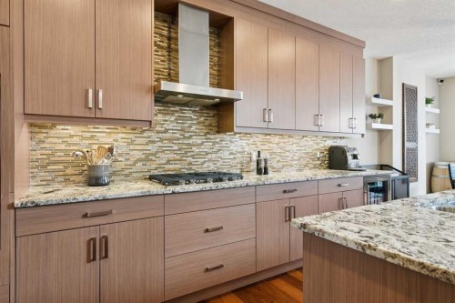 36 Ridge View Close, Cochrane, AB - Indoor Photo Showing Kitchen With Upgraded Kitchen