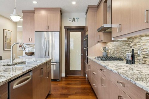 36 Ridge View Close, Cochrane, AB - Indoor Photo Showing Kitchen With Stainless Steel Kitchen With Upgraded Kitchen