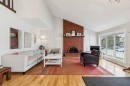 1848 38 Street Ne, Calgary, AB  - Indoor Photo Showing Living Room With Fireplace 