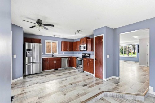 212 Harvest Wood Way Ne, Calgary, AB - Indoor Photo Showing Kitchen With Stainless Steel Kitchen