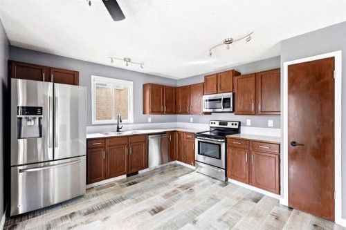 212 Harvest Wood Way Ne, Calgary, AB - Indoor Photo Showing Kitchen With Stainless Steel Kitchen