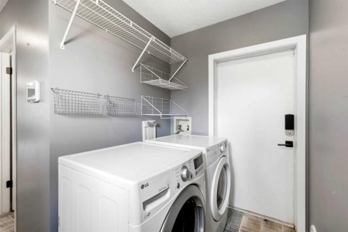212 Harvest Wood Way Ne, Calgary, AB - Indoor Photo Showing Laundry Room
