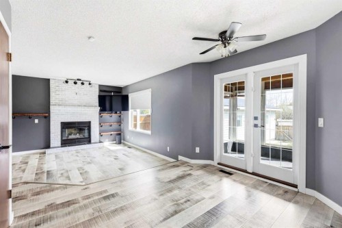 212 Harvest Wood Way Ne, Calgary, AB - Indoor With Fireplace