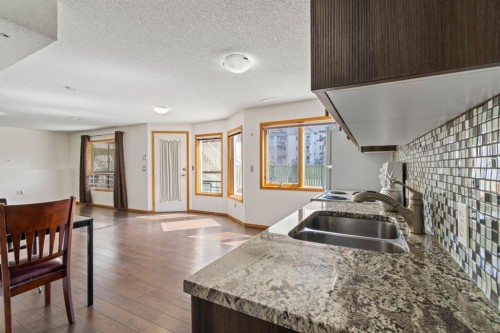 87 Applefield Close Se, Calgary, AB - Indoor Photo Showing Kitchen With Double Sink