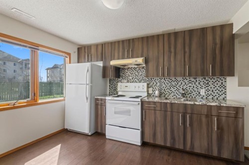 87 Applefield Close Se, Calgary, AB - Indoor Photo Showing Kitchen