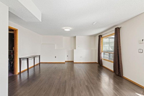 87 Applefield Close Se, Calgary, AB - Indoor Photo Showing Other Room