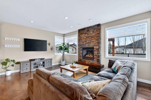 28 Walden View Se, Calgary, AB - Indoor Photo Showing Living Room With Fireplace