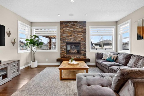 28 Walden View Se, Calgary, AB - Indoor Photo Showing Living Room With Fireplace