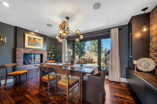 2007 Glenwood Drive Sw, Calgary, AB - Indoor Photo Showing Dining Room With Fireplace