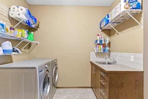69 Everoak Circle Sw, Calgary, AB - Indoor Photo Showing Laundry Room