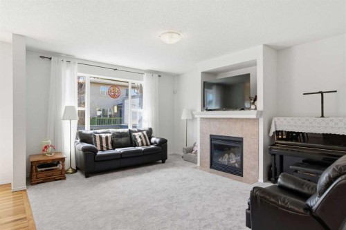 69 Everoak Circle Sw, Calgary, AB - Indoor With Fireplace