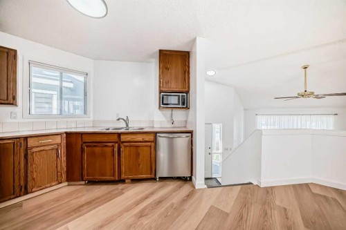 314 Castleridge Drive Ne, Calgary, AB - Indoor Photo Showing Kitchen With Double Sink
