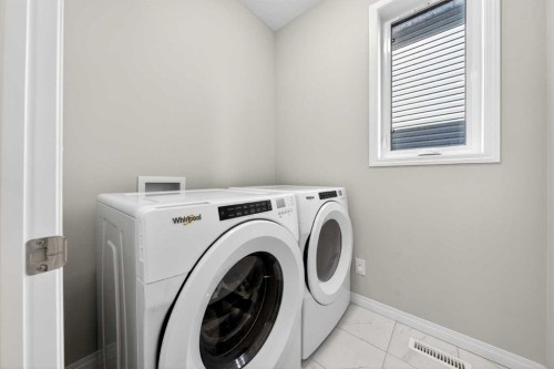 95 Carrington Close Nw, Calgary, AB - Indoor Photo Showing Laundry Room
