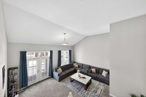 95 Carrington Close Nw, Calgary, AB - Indoor Photo Showing Living Room
