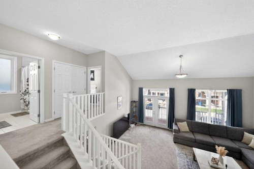 95 Carrington Close Nw, Calgary, AB - Indoor Photo Showing Living Room