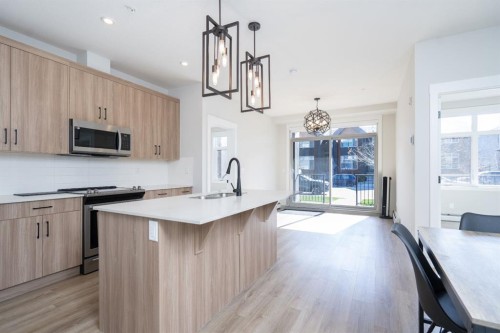 3110-200 Seton Circle Se, Calgary, AB - Indoor Photo Showing Kitchen With Upgraded Kitchen