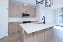 3110-200 Seton Circle Se, Calgary, AB  - Indoor Photo Showing Kitchen With Double Sink 