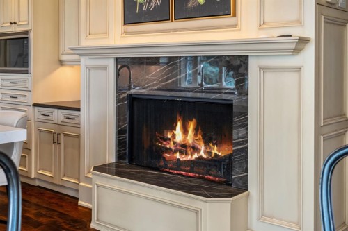 12231 Lake Louise Way Se, Calgary, AB - Indoor With Fireplace