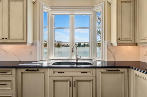 12231 Lake Louise Way Se, Calgary, AB - Indoor Photo Showing Kitchen With Double Sink