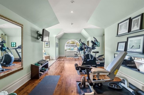 12231 Lake Louise Way Se, Calgary, AB - Indoor Photo Showing Gym Room